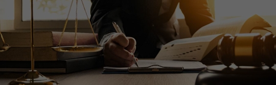 a man writing something down